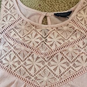 pink flowy tank top with eyelet detail